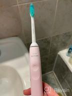 img 2 attached to Philips Sonicare 2100 Series HX3651 Sound Toothbrush, pink review by Hiral Yadav ᠌