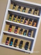 img 1 attached to Rustic Grey White Wall Mounted Essential Oil Display Shelf Rack For Essential Oils And Nail Polish - LIANTRAL Essential Oil Storage Solution review by Nicole Cook