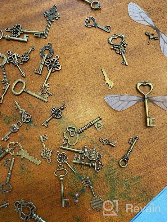 img 1 attached to 40 Flying Keys Charms With Dragonfly Wings, Vintage Skeleton Key DIY Set, And Elastic Crystal String For Perfect Wedding And Party Decorations review by Joseph Anderson