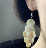 img 1 attached to Handcrafted White Kabibe Shell Circle Earrings By AeraVida: Enchanting Dangle Style review by Angie Miller