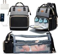kuak 3-in-1 diaper bag backpack: travel bassinet, changing station, insulated pockets logo