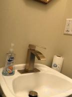 картинка 1 прикреплена к отзыву 🚰 Matte Black Brass Waterfall Bathroom Sink Faucet with Single Handle, Square Vanity Design, Escutcheon, and Pop Up Drain Assembly – TRUSTMI от Bob Kussmaul