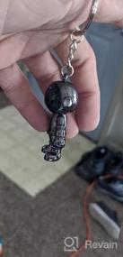 img 8 attached to Creative Spacemen Black Robot Keychain For Men - Perfect Office, Backpack, Purse Charm And Car Key Chain Ring