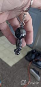 img 8 attached to Creative Spacemen Black Robot Keychain для мужчин - идеальный офис, рюкзак, подвеска для кошелька и кольцо для автомобильного брелка