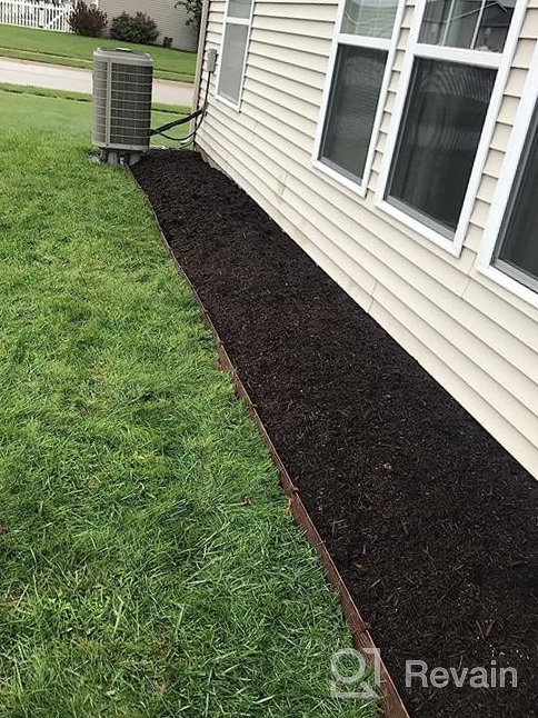 img 1 attached to Get Beautiful Garden Borders With Easyflex 3310E-20C Landscape Edging In Black - 20 Ft Long review by Carrie Williams