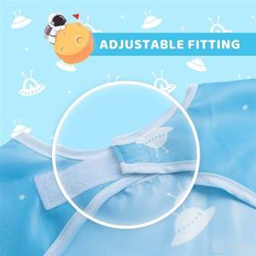 img 1 attached to 🍽️ Little Dimsum Mess-Proof Baby Bibs: Long Sleeve Waterproof Feeding Smock for Infants and Toddlers - Catch Food & Wipe Clean! (Pack of 2 Colors: Glatic & Spaceship)