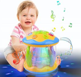 img 4 attached to Музыкальные детские игрушки для обучения и развития: вращающиеся океанские игрушки с подсветкой для животика, идеально подходят для младенцев и малышей в возрасте от 6 до 24 месяцев, идеальные подарки для мальчиков и девочек в возрасте 1 года - Vanmor