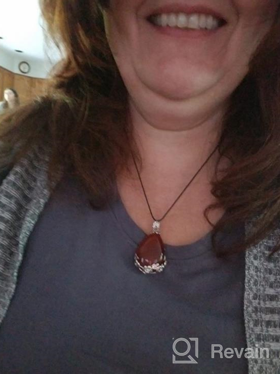 img 1 attached to 💎 Top Plaza Waterdrop Chakra Reiki Energy Crystal Pendants - Amethyst, Carnelian, Black Agate, Bluesand, and Opalite with 5 Chains review by Nicole Torres