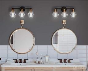 img 2 attached to 💡 3-Light Antique Bronze Coastal Bath Vanity Light with Clear Glass - Hansford Collection