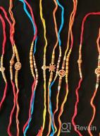 img 1 attached to Set of 12 Assorted Design Rakhi with Beads, Bracelet Multi Design Beads and Assorted Color - Rakhi for Brothers review by Michael Copeland