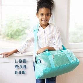 img 1 attached to Wildkin Kids Overnighter Duffel Bag: Perfect For Sleepovers & Travel, Carry-On Size & Ideal For School Practice Or Overnight (Blue Glitter)