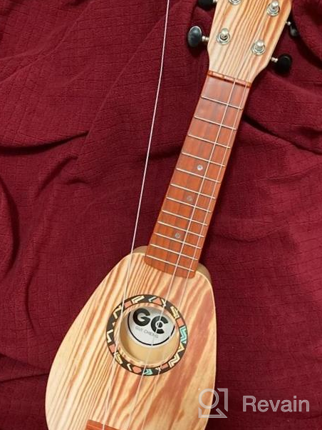 img 1 attached to 17 Inch Kids Guitar Ukulele: 4 Strings Ukeleles For Toddlers & Babies - Educational Learning Toy By Satisfounder review by Nicholas Peters