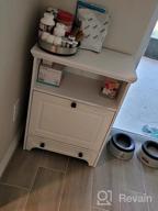 img 1 attached to Stylish White Farmhouse Pet Station With Pull Out Bowls & Storage Cabinet For Modern Pet Care review by Rafael Lee