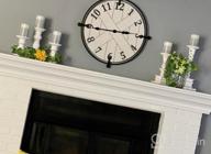img 1 attached to 24-Inch Farmhouse Barn Door Clock By PresenTime & Co - Silent, No Ticking, Solid Wrought Iron Clock With Shiplap Design In Elegant Cream White Color review by Ryan Hare