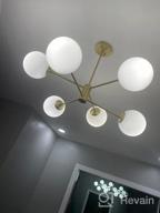 картинка 1 прикреплена к отзыву Liara Caserti Black Sputnik Chandelier - Modern Ceiling Light with 6 Glass Globe Lights - Mid Century Modern Chandelier for Dining Room, Kitchen, Bedroom - Sputnik Light Fixture, UL Listed от Antonio Parson