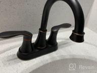 картинка 1 прикреплена к отзыву Modern Commercial Bathroom Faucet With Two Handles, Oil Rubbed Bronze Finish, Lead-Free, Includes Drain Stopper And Water Hoses For Vanity Sink от Eric Grayson
