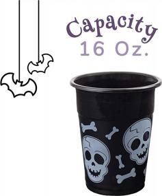 img 1 attached to Spooktacular Halloween Party Essentials: 50 Disposable 16 Oz Plastic Cups With Black And White Skull And Bone Design