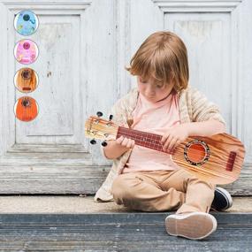 img 3 attached to Introducing Our 17-Inch Kids Ukulele Guitar Toy: The Perfect Musical Instrument For Toddler Beginner Learning