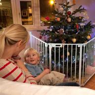 🚸 spacious 80 inch auto close baby gate: safety fence for fireplace, stairs, doorways, and hallway - foldable, easy operation, hardware mount, adjustable panels - ideal for christmas tree! logo