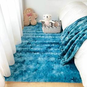 img 4 attached to NEWCOSPLAY Faux Fur Area Rug Rainbow Tie Dye Carpet Playing Mat For Girls Bedroom Living Room Home Décor (3' X 5', Blue Rainbow)