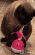 img 1 attached to Keep Your Cat Entertained! Automatic Interactive Cat Toy With Feather, Swing Ball, And Sound - Includes Detachable Rocker And Light Ball In Green review by Ryan Reed