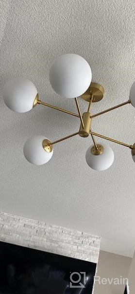 img 1 attached to Liara Caserti Black Sputnik Chandelier - Modern Ceiling Light with 6 Glass Globe Lights - Mid Century Modern Chandelier for Dining Room, Kitchen, Bedroom - Sputnik Light Fixture, UL Listed review by Kyle Deel