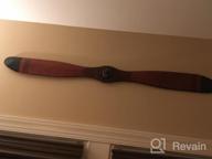 img 1 attached to Aviation-Inspired Wooden Propeller Wall Decor With 2 Blades And Detailed Design, 48" X 2" X 5", In Brown By Deco 79 review by Jackie