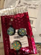 img 1 attached to Flower Power: 5 Pack Fabric Retractable Badge Holders With Alligator Clip And Flower ID Badge Reel review by Shauna Bishop