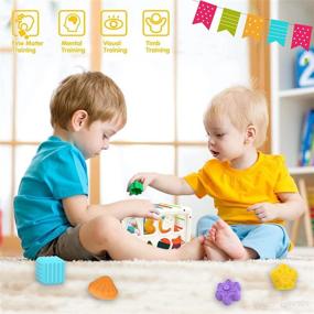 img 2 attached to 🧩 Montessori Toys for 1 Year Old - MOZYJIGAO Upgrade Baby Shape Sorter Toys with Elastic Bands for Sensory Shape Building Blocks - Fine Motor Skills Development - Toddler Toys Age 2 - Baby Toys for 18+ Months - Gifts for Boys and Girls