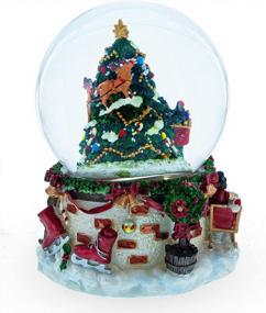 img 2 attached to Musical Snow Globe With Santa, Snowman & Dogs Watching Christmas Tree - Perfect For Holiday Decor!