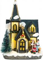 magical christmas scene: lighted village church with snowy village and charming figurines logo