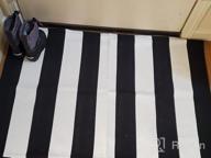 img 1 attached to Hand-Woven Reversible Cotton Rug: Black & White Stripes, 35.5'' X 59'', Perfect For Layering Front Doormats, Laundry Room Or Farmhouse Kitchen, Foldable & Washable Area Rug review by Dick Grayson