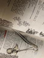 img 1 attached to Vintage Glow in The Dark Metal Bookmarks: Dragon & Owl Antique Silver 2 Pack, Perfect Gift for Men and Women review by Udders Sharma