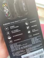 img 1 attached to Smart Xiaomi Mi Band 7 Global bracelet for Russia, black review by Anson Keith ᠌
