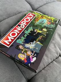 img 11 attached to Monopoly board game. RICK AND MORTY 17+ HASBRO GAMING 503386