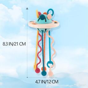 img 3 attached to 18M+ Montessori Toys: UFO Food Grade Silicone Pull String Activity Toy for Toddlers, Sensory and Fine Motor Skills Development, Travel-Friendly Baby Toys - Ideal Gift