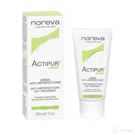 noreva actipur anti imperfections day treatment логотип