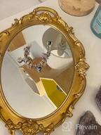img 1 attached to 🔍 Zosenley Gold Polyresin Ellipse Antique Decorative Mirror Tray - Makeup, Jewelry & Serving Organizer - 9.8”x 14.6” Size review by Matthew Wheeler