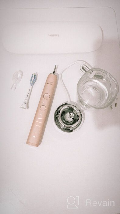 img 2 attached to Philips Sonicare DiamondClean 9000 HX9911 sonic toothbrush, pink review by Anastazja Chteinman ᠌