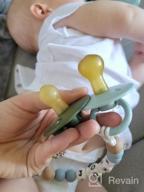 img 1 attached to Safe And Stylish: Itzy Ritzy Natural Rubber Pacifiers With Cherry-Shaped Nipple And Large Air Holes, Set Of 2 In Mint And White For Newborns review by Erica Williams