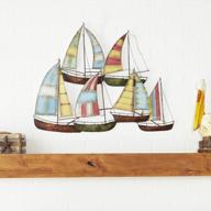 add a nautical touch with 33-inch metal sail boat wall decor in multi-colored logo
