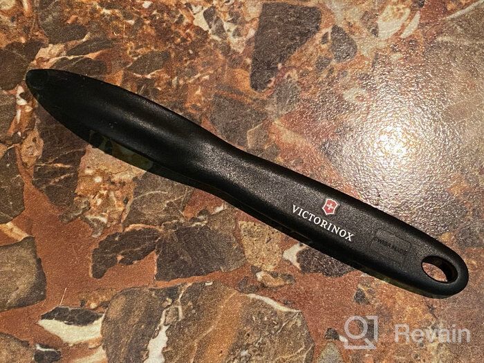 img 1 attached to 🔪 Versatile and Sleek: Victorinox Universal Peeler in Black review by Kai Wen ᠌