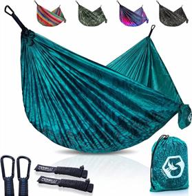 img 4 attached to Foxelli Lightweight Portable Nylon Hammock With Tree Ropes And Carabiners – Ideal For Camping, Hiking, Backpacking, Travel, Beach, Backyard & Garden Activities