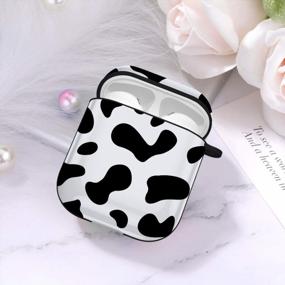 img 3 attached to Protect Your Airpods In Style With Hamile Cute Cover - Black Cow Pattern For Girls, Women, And Boys - Compatible With Apple Airpod 2 & 1 - Portable Keychain Accessories Included