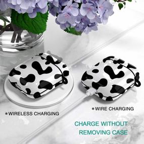 img 1 attached to Protect Your Airpods In Style With Hamile Cute Cover - Black Cow Pattern For Girls, Women, And Boys - Compatible With Apple Airpod 2 & 1 - Portable Keychain Accessories Included