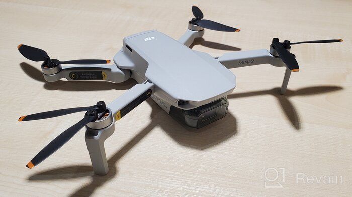 img 1 attached to Quadcopter DJI Mini 2 Fly More Combo, gray review by Guo Tai Lim ᠌