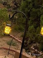 img 1 attached to Solar Hanging Mason Jar Lights With Stakes (4-Pack) - Outdoor Waterproof Decorative Solar Lantern Lamp, Vintage Glass Jar Starry Fairy Light With 30 LEDs For Patio Garden Tree Yard review by Brandon Thompson