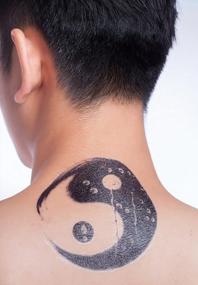 img 1 attached to Black And White Yin Yang TaiChi Temporary Tattoo Stickers For Arms, Legs, And Neck