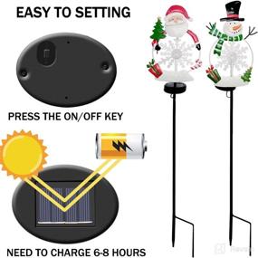 img 1 attached to Christmas Decorations Solar Garden Stake Lights - 2 Pack Metal Santa and Snowman with Plastic Snowflake: Waterproof Outdoor Xmas Yard Pathway Lights for Lighted Christmas Landscape Ornament