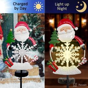 img 2 attached to Christmas Decorations Solar Garden Stake Lights - 2 Pack Metal Santa and Snowman with Plastic Snowflake: Waterproof Outdoor Xmas Yard Pathway Lights for Lighted Christmas Landscape Ornament